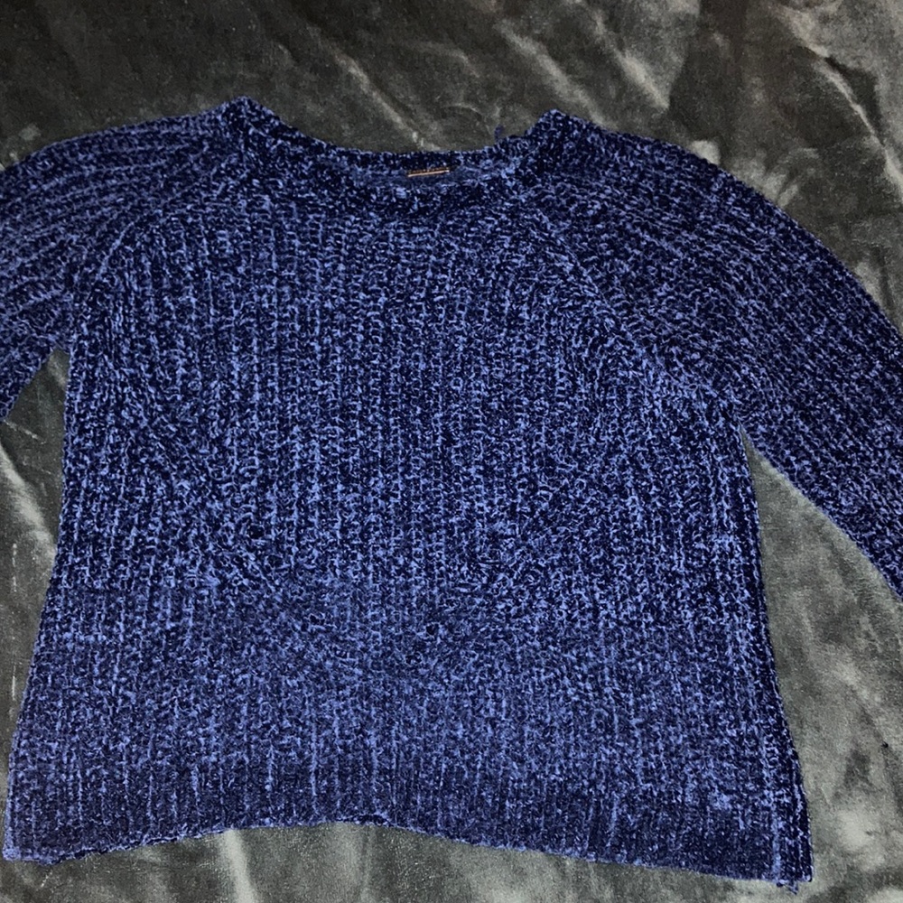 A fuzzy blue sweater!